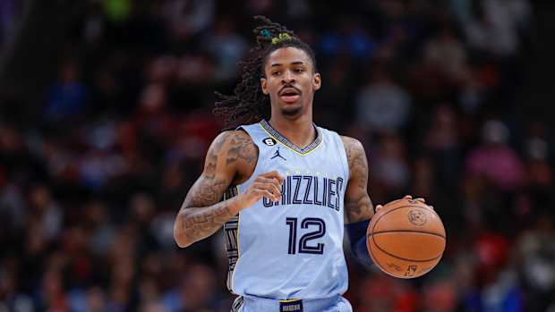 Memphis Grizzlies guard Ja Morant dribbles the basketball.